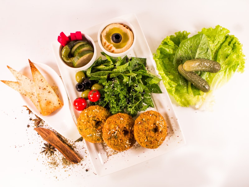 [Temporary stock photo] [Placeholder alt text] Falafel plate with salad and hummus